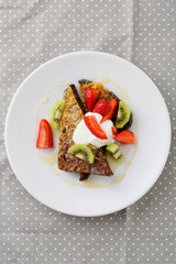 Breakfast toast with strawberry and cream fraiche