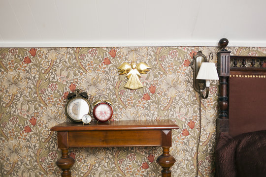 Alarm clocks on sideboard