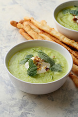 Bowls of zucchini cream soup