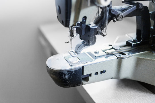 Close-up of sewing machine in jeans factory