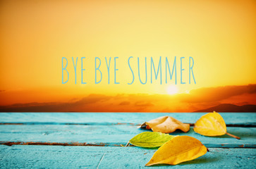 Autumn background with the phrase BYE BYE SUMMER