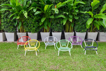 Fototapeta na wymiar colorful weave chairs in garden