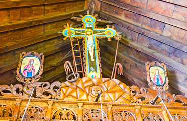 The wooden iconostasis