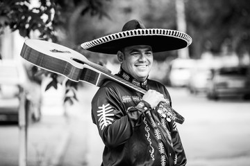 Mexican, Latin American, Spanish. Musicians on the streets.