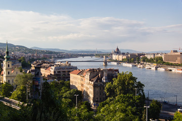 Fototapeta premium cityscape landscape of bridges over Donau river in Budapest, Hungary during sunset