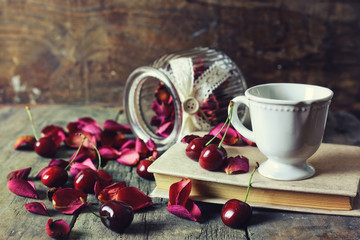 vintage composition cherry berry on wooden background