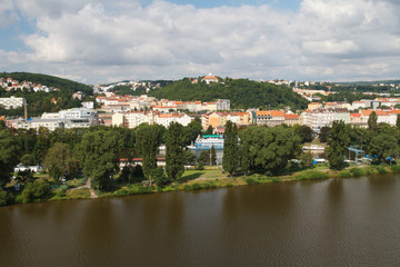 Fototapeta na wymiar View from Vysehrad on the river Vltava and residential buildings. Prague