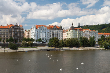 Fototapeta premium Summer in Prague. Nice view of the Vltava River and the promenade.