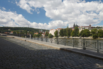 nice view from the embankment of the Vltava river on the Prague Castle
