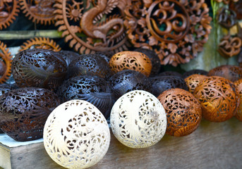 Obraz premium Coconut carving souvenir from Bali, Indonesia