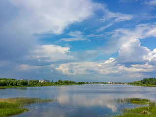 Obraz na płótnie Canvas Beautiful nature, river and cloudy blue sky/Beautiful nature, river and cloudy blue sky