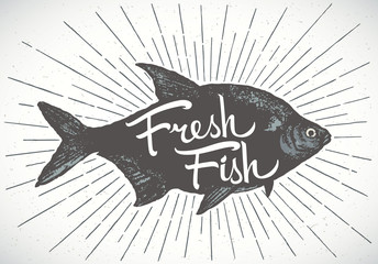 Fish label, silhouette of a fish with the inscription. Vector illustration painted by hand. 