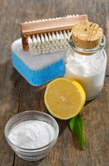 Baking soda, lemon, sponge for cleaning