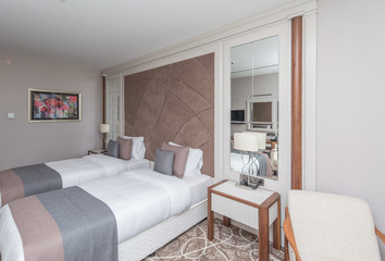 Modern hotel room with big bed