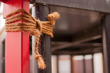 Holding rope barriers