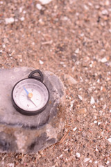 Kompass im Sand