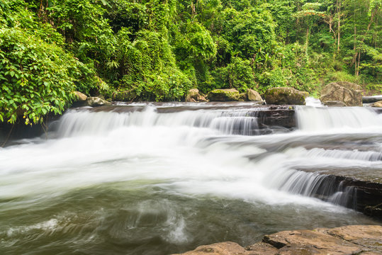 Waterfall in deep rainforest.
