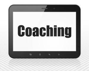 Studying concept: Tablet Pc Computer with Coaching on display