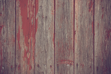 Wooden planks background with red paint