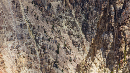 Fototapeta na wymiar Rocky walls along the Grand Canyon of the Yellowstone. It is the view from Artist Point. Yellowstone National Park, Wyoming