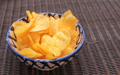 spanish chips in a ceramic bowl