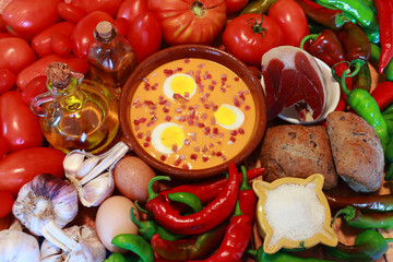 Salmorejo is a typical food of Andalusia, in southern Spain. Its ingredients are tomato, pepper, bread, garlic, salt, olive oil and vinegar, all crushed, and garnished with boiled egg and ham.