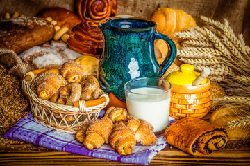 fresh bread and wheat on the wooden