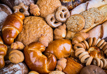 fresh bread and wheat on the wooden