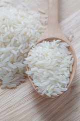 Jasmine rice and wooden spoon