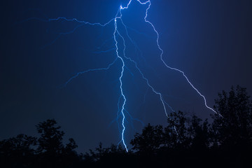 Nature lightning bolt at night thunder storm