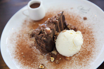 Dark chocolate cake with vanilla ice cream