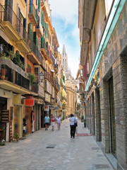 Street in Palma de Majorca, Spain - Cathedral La Seu in background © aldorado