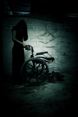 Ghost woman with wheelchair in asylum,Scary background for book cover