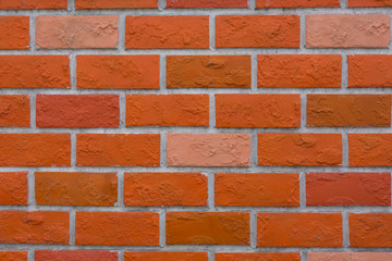 Empty orange  brick wall textured background.