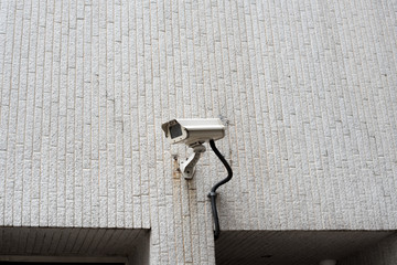 CCTV camera or surveillance installed on wall