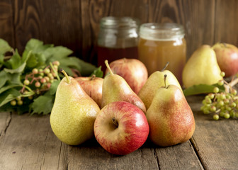 Autumn concept. Fall pears on wood and honey.Thanksgiving dinner