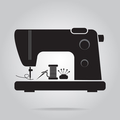Sewing machine with needle and pin icon