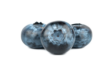 Three ripe blueberries