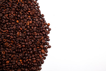 Frame of roasted coffee beans isolated on white