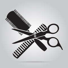 Hair salon with scissors and comb icon