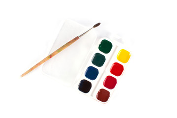 watercolor paints with a brush