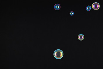 soap bubbles on black