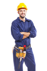 Smiling worker with arms crossed on white background