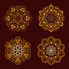 Set from Vector Gold Color Mandala over dark brown