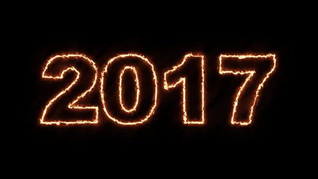 2017 - happy new hot year. Fire text in 4k ultra hd