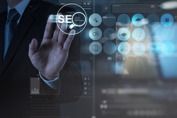 Double exposure of businessman hand showing search engine optimi