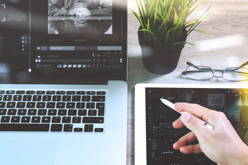 businessman hand working stylus pen and digital tablet computer