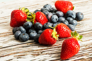 Handful or Portion of Fresh Ripe Strawberries and Blueberries