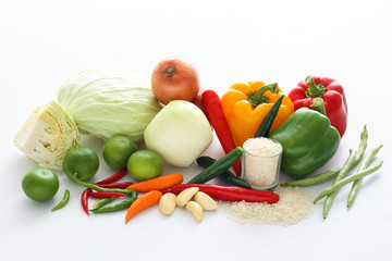 Fresh vegetables on white background.