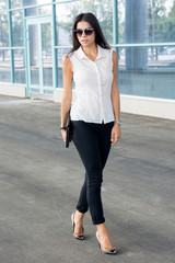 woman walking near business centre